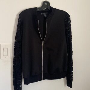 Black bomber jacket with lace sleeves